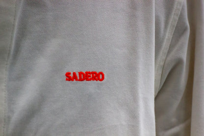 Camisa piqué marfil bordado naranja
